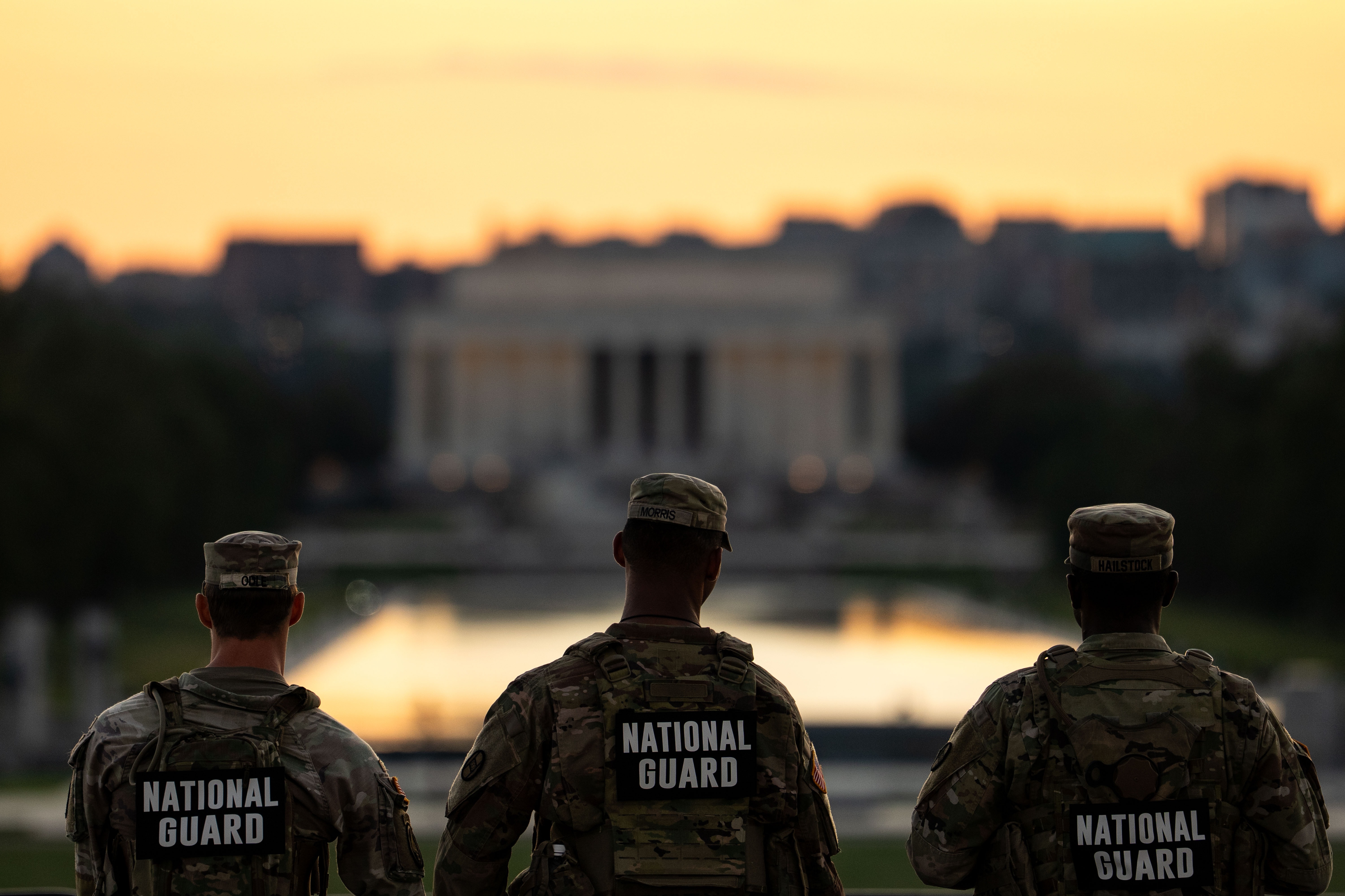 Members of the National Guard are seen standing near the Washington Monument on September 2 in Washington, D.C. National Guard troops continue to patrol the nation